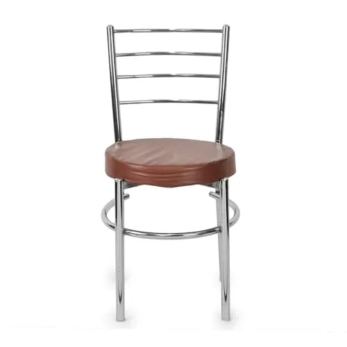Bottom view of welded steel joints and rubber feet of the heavy-duty steel dining chair showing industrial construction quality.