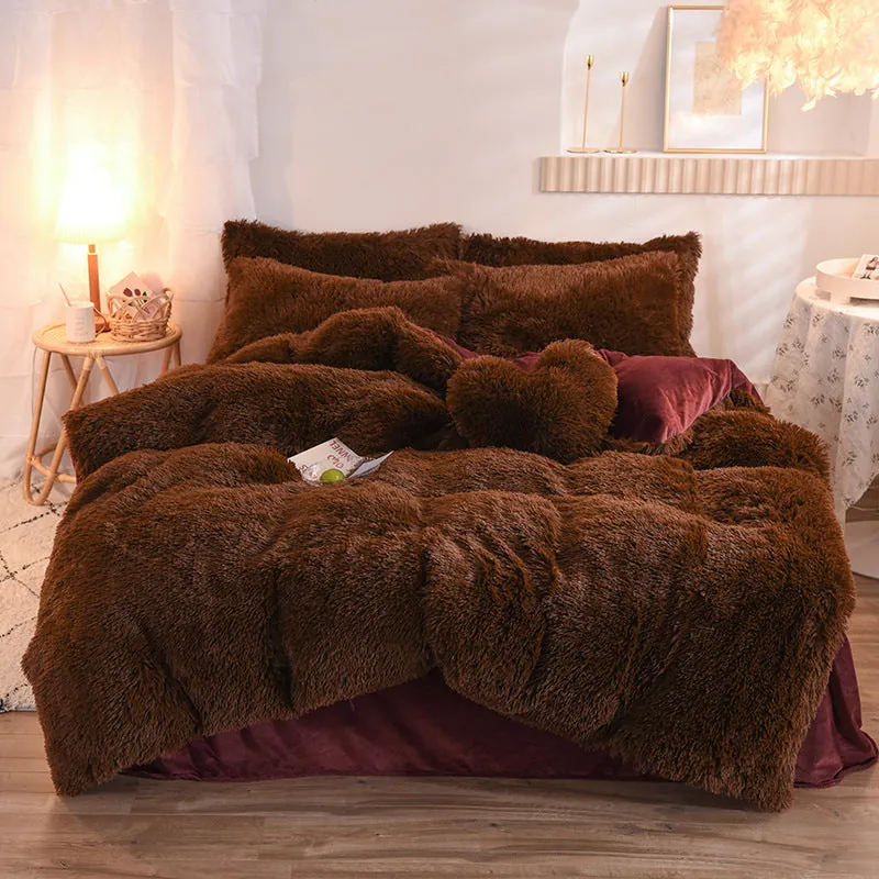 Pink fleece duvet cover set in soft blush pink color with thick plush texture visible on a styled bed
