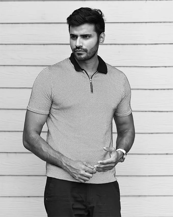 Posh Monk polo on a confident Indian man at golden hour, sharp collar visible