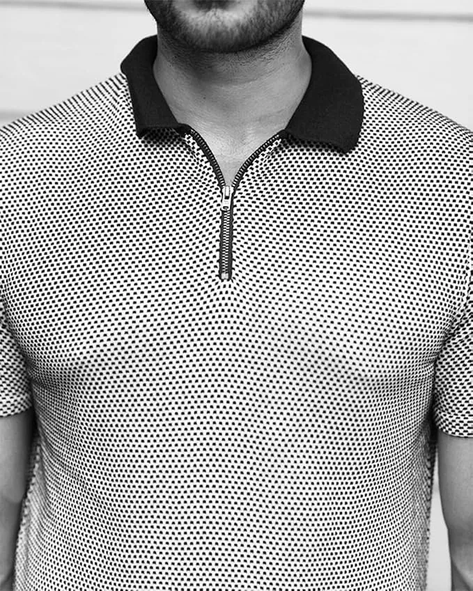 Lifestyle shot of the polo in an office setting, sharp professional vibe