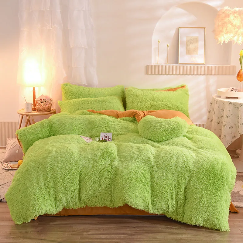 Red fleece duvet cover set in vibrant crimson color with thick plush texture styled on a cozy bed